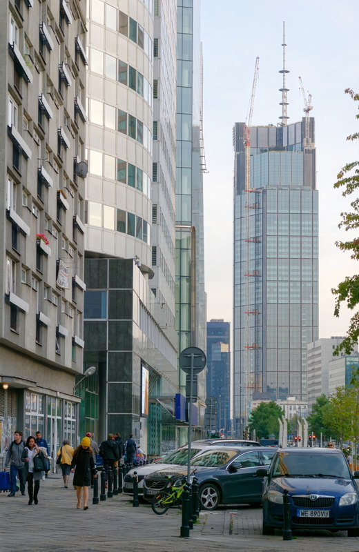 30 - A street view in Warsaw, Poland, featuring the Varso Tower under construction in the background